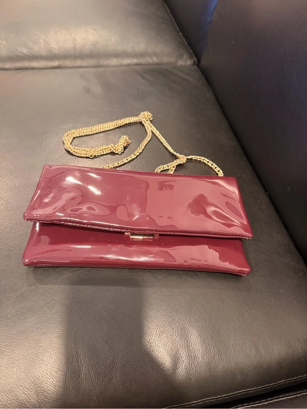 Steve Madden Glossy Burgundy Patent Clutch with Gold Chain